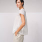 Blusa in cotone con scollo a V e volant