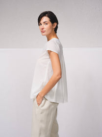 Blusa in cotone con scollo a V e volant