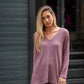Tunica in maglia a coste con scollo a V