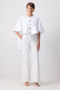 Poncho in cupro bianco con bottoni dorati