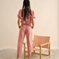 Pantaloni in twill con spille decorative