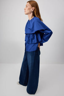 Blusa corta indaco con balze e maniche a sbuffo in cotone misto