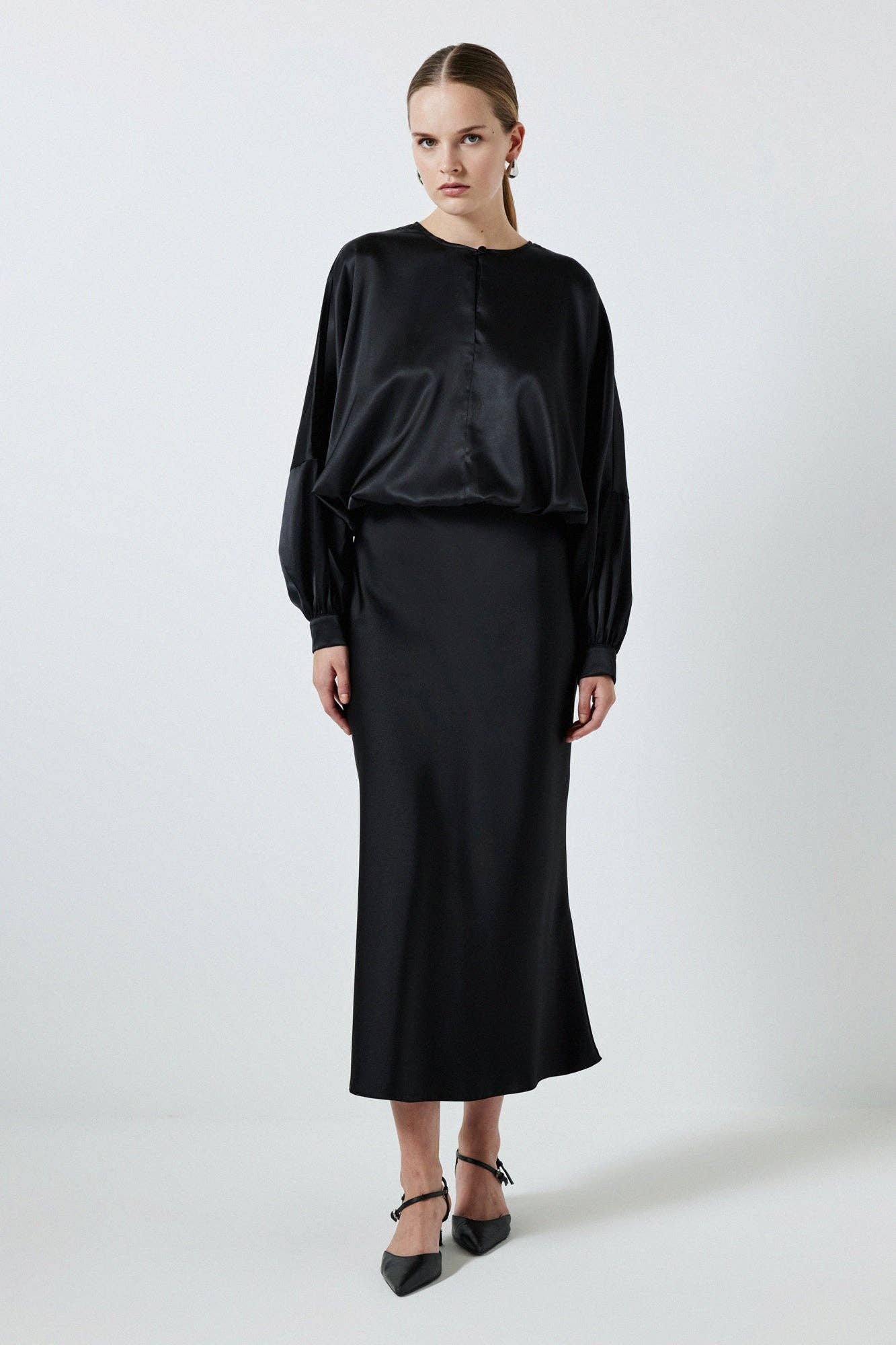 Blusa in raso con elastico in vita