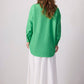 Camicia oversize verde ricamata con motivo astratto in misto cotone