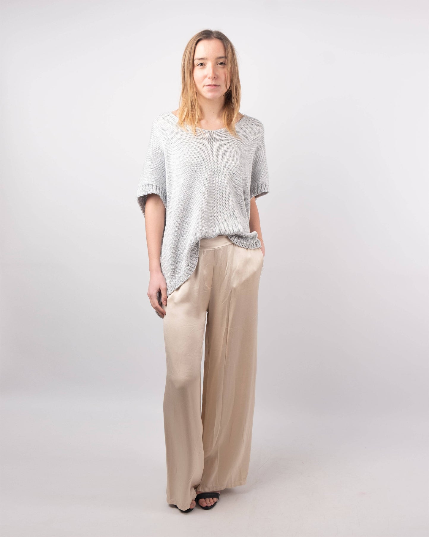 Maglione corto in maglia metallizzata con maniche corte