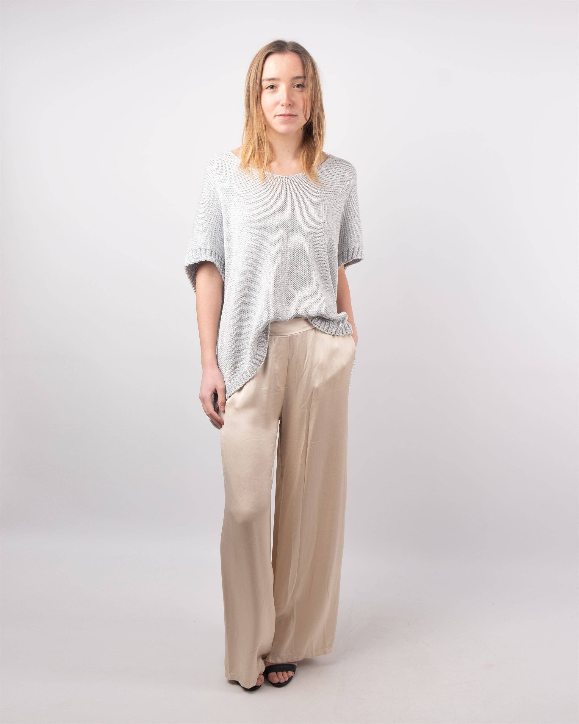 Maglione corto in maglia metallizzata con maniche corte