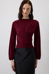 Blusa drappeggiata bordeaux con maniche a palloncino
