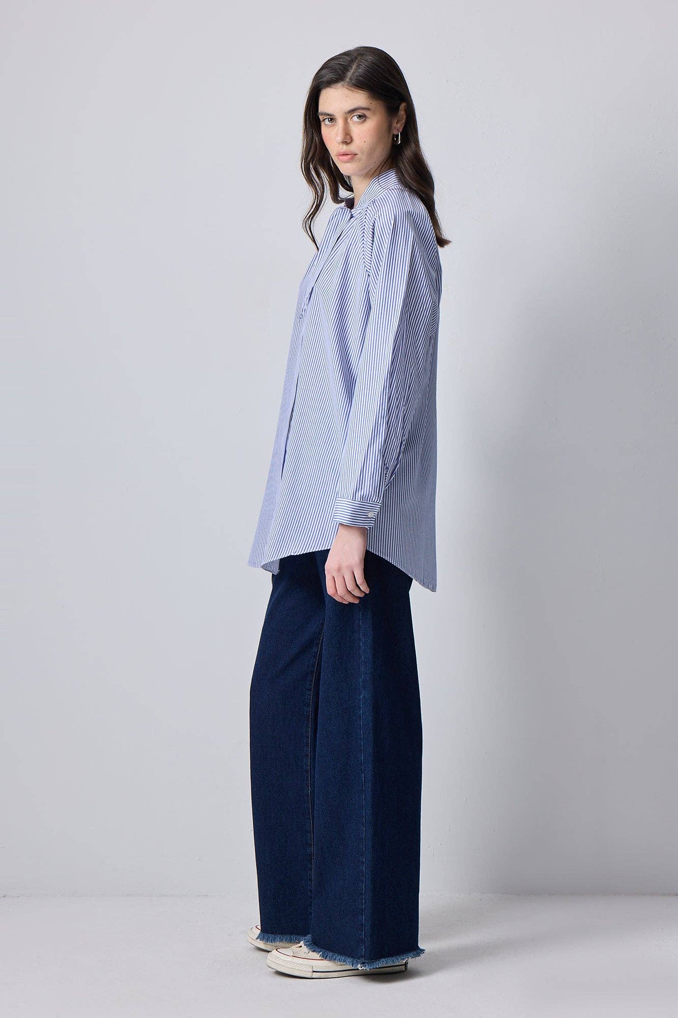Camicia a righe con collo a fiocco