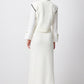 Set in maglia gilet e gonna longuette ecru con bottoni gioiello