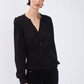 Blusa tinta unita con pieghe