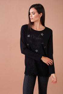 Blusa nera con stelle glitter e scritta