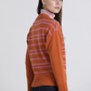 Maglione bicolor a righe