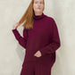 Maglione lungo dolcevita in misto cashmere con lavorazione 3D