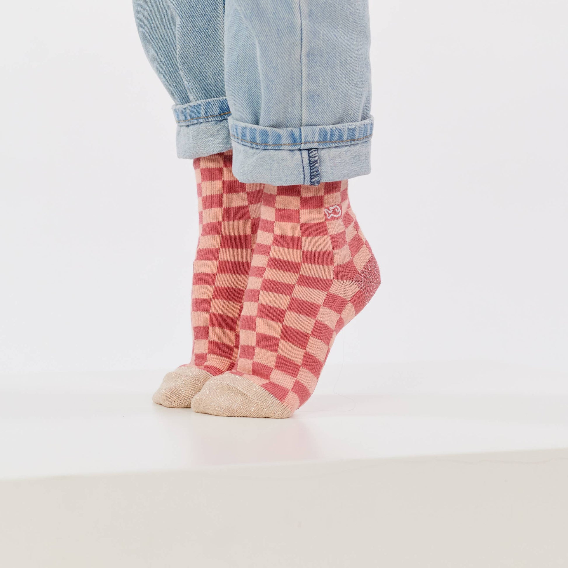 Calzini a quadri da bambina rosa e pesca