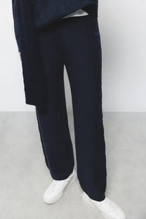 Pantaloni larghi in maglia con dettagli crochet
