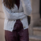 Cardigan in maglia traforata con bottoni