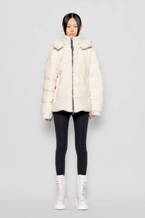 Piumino in eco shearling con cappuccio removibile
