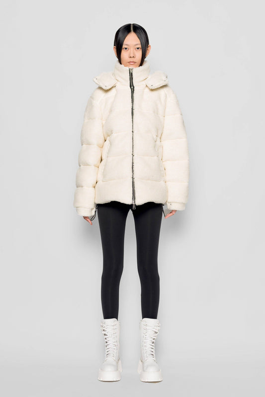 Piumino in eco shearling con cappuccio removibile