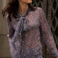 Blusa floreale lilla con fiocco