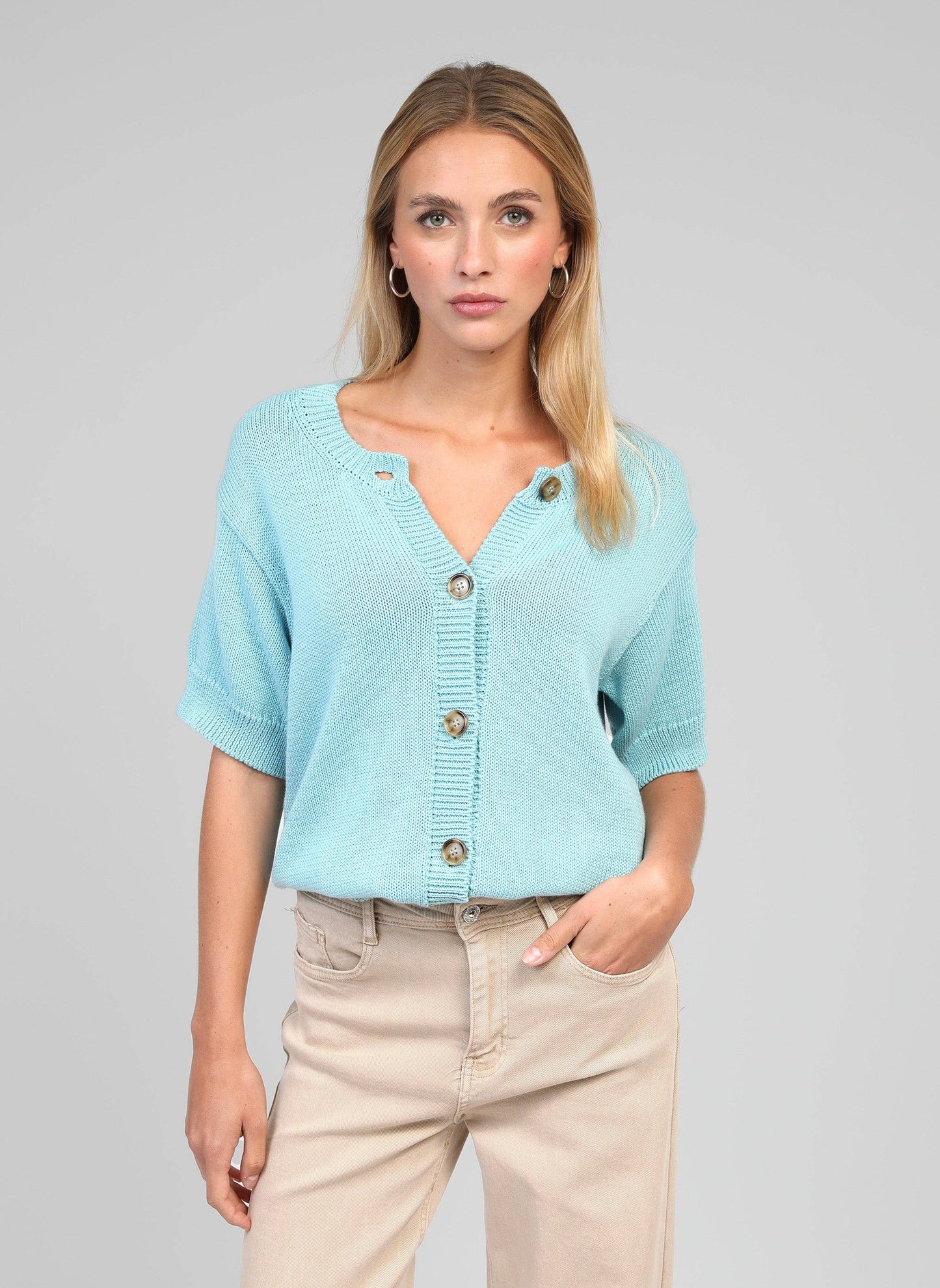 Cardigan in maglia turchese con bottoni e scollo a V