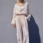 Completo donna camicia testurizzata con cintura e pantaloni palazzo