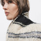 Cappotto bouclé intrecciato a righe con cintura