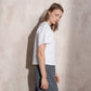 T-shirt bianca con applicazione lucida