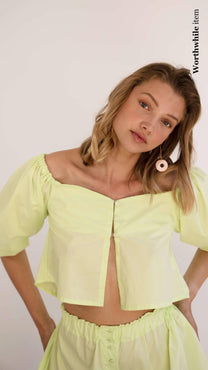 Top corto verde lime in cotone biologico con maniche a sbuffo