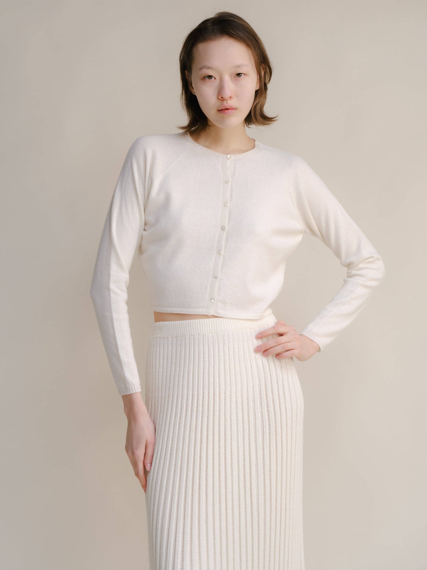 Cardigan corto in misto cashmere con lavorazione 3D