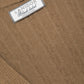 Gilet in maglia strutturata a trecce con scollo a V