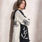 Cappotto cardigan in maglia con cappuccio e zip bicolor con stampa grafica