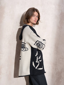 Cappotto cardigan in maglia con cappuccio e zip bicolor con stampa grafica