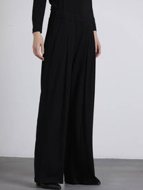 Pantaloni palazzo con pinces e vita elastica