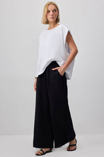 Pantaloni palazzo in cotone con dettagli sfrangiati