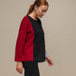 Maglia donna color block con bottoni ai polsi
