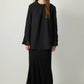 Tunica in crêpe nera con polsini in chiffon trasparente