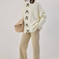 Cardigan in maglia con dettagli a fiocco