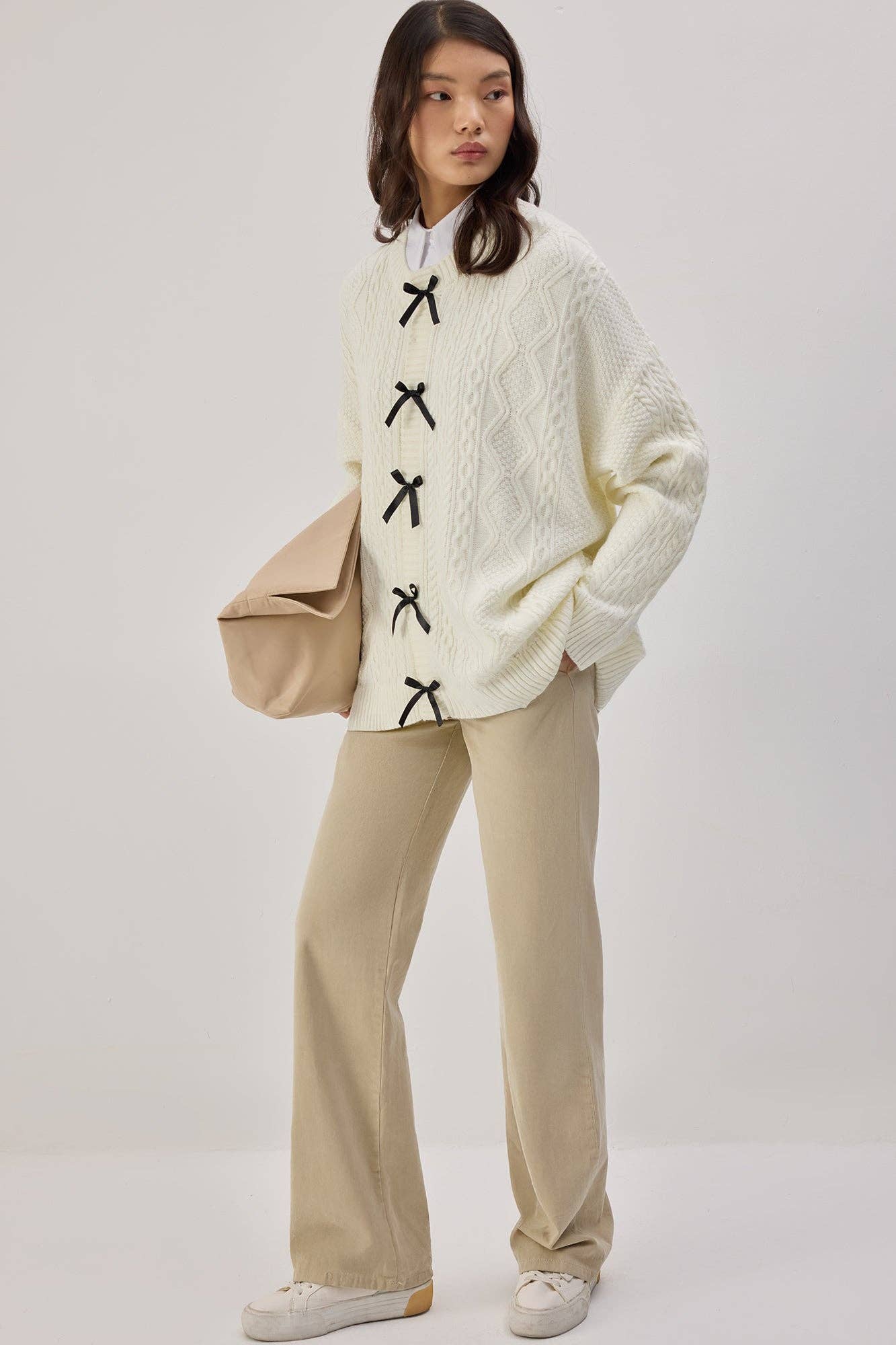 Cardigan in maglia con dettagli a fiocco