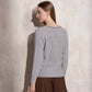 Maglione in maglia di lurex con scollo a V