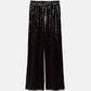 Pantaloni a palazzo con paillettes