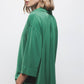 Blusa oversize verde con colletto classico