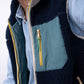 Gilet sherpa unisex con zip bicolor blu navy e verde