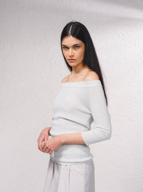 Maglione lurex off-shoulder