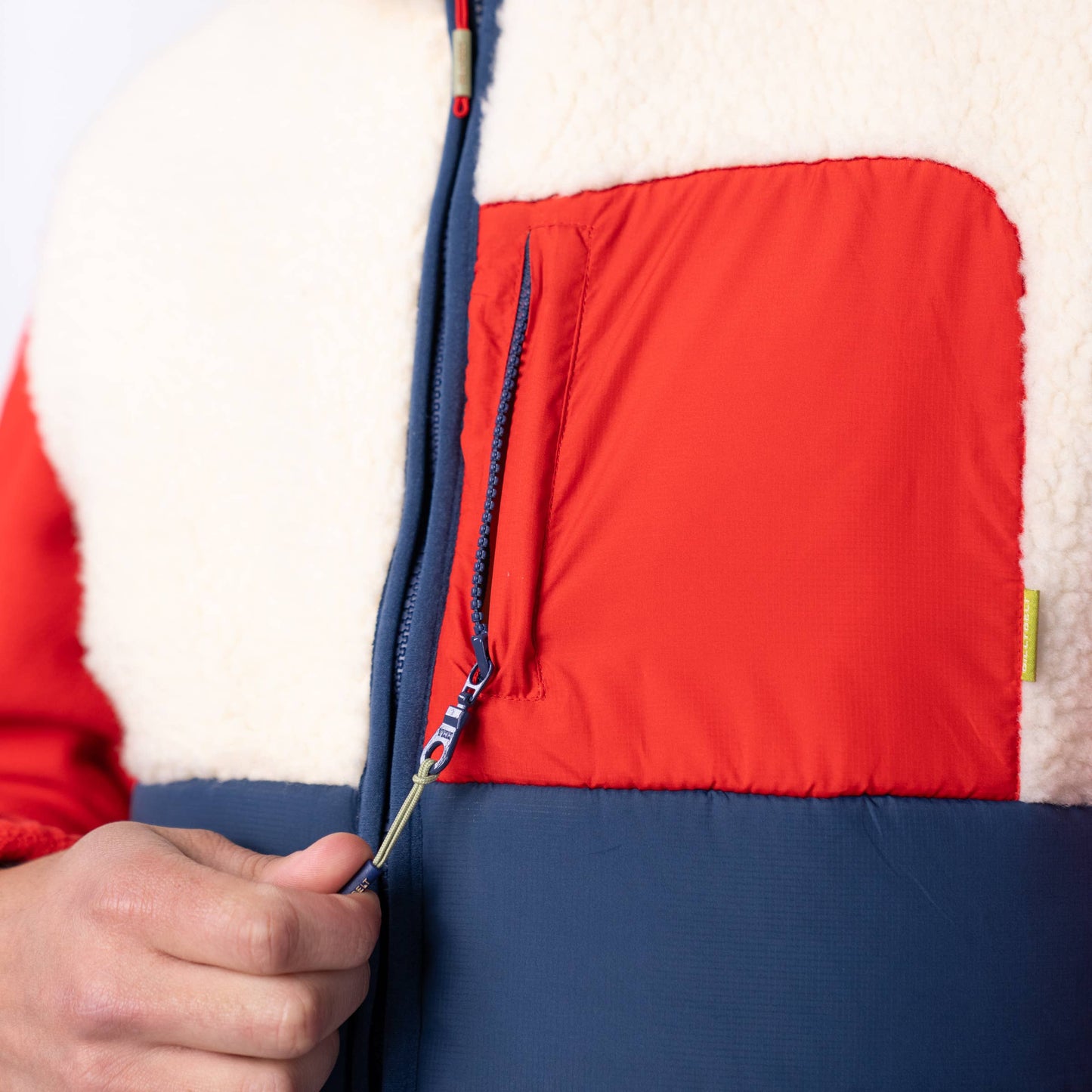 Gilet smanicato sherpa color block avorio e blu navy