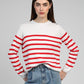 Maglione a righe rosse e bianche con bottoni sulla spalla
