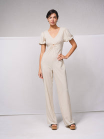 Tuta lunga a gamba larga con scollo a V e cut-out