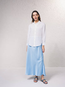 Camicetta oversize con bottoni frontali e colletto classico