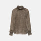 Blusa semitrasparente animalier con collo alto