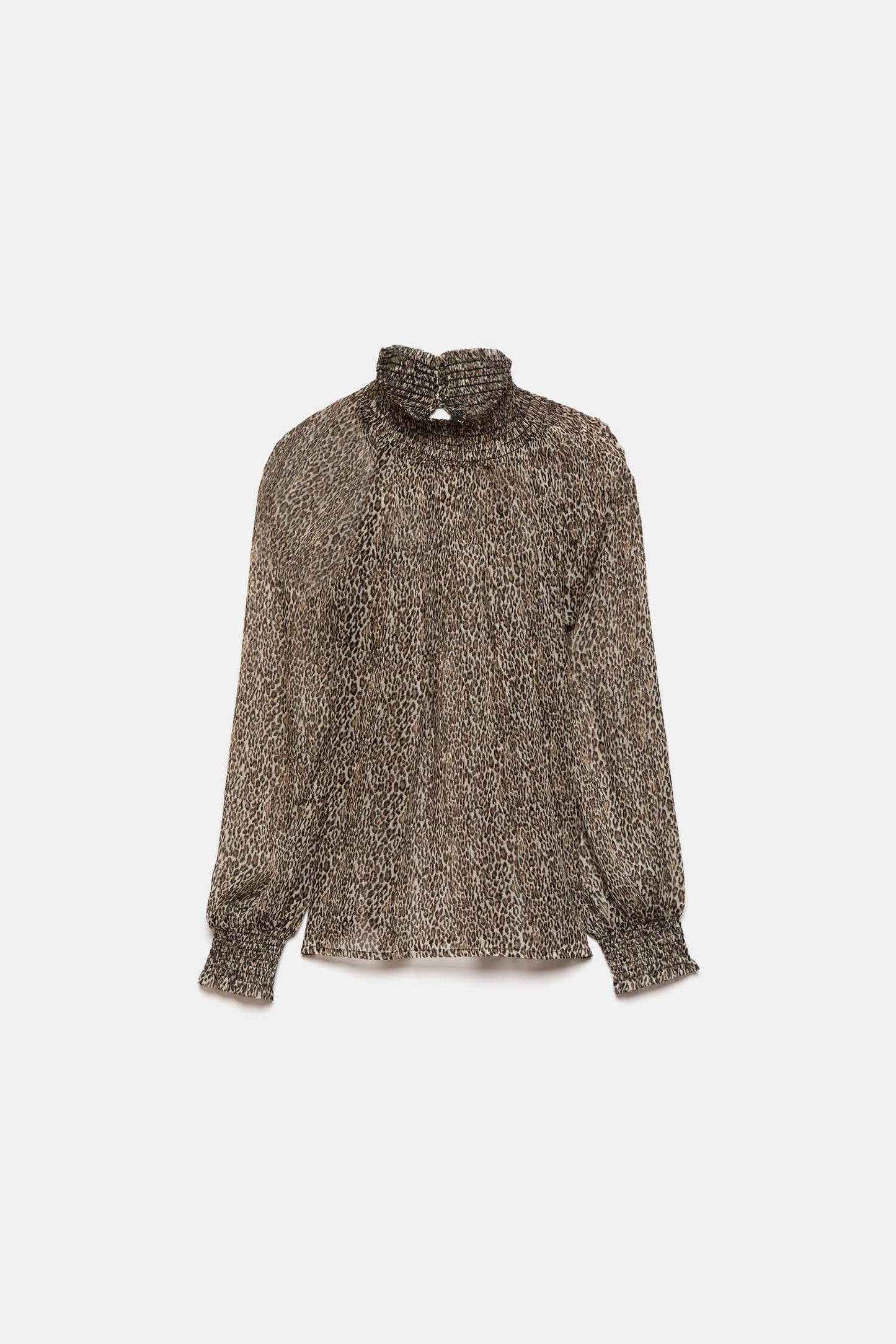 Blusa semitrasparente animalier con collo alto