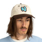 Cappellino vintage con logo ricamato in cotone biologico